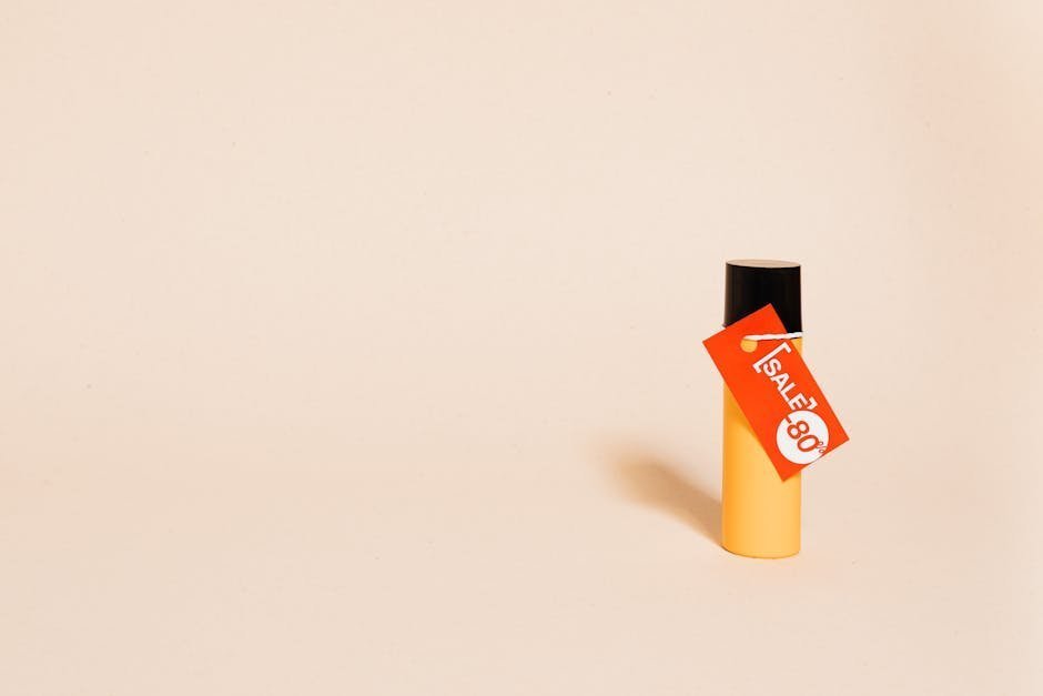 Yellow bottle with a bold 80% sale tag on a neutral background, perfect for marketing.